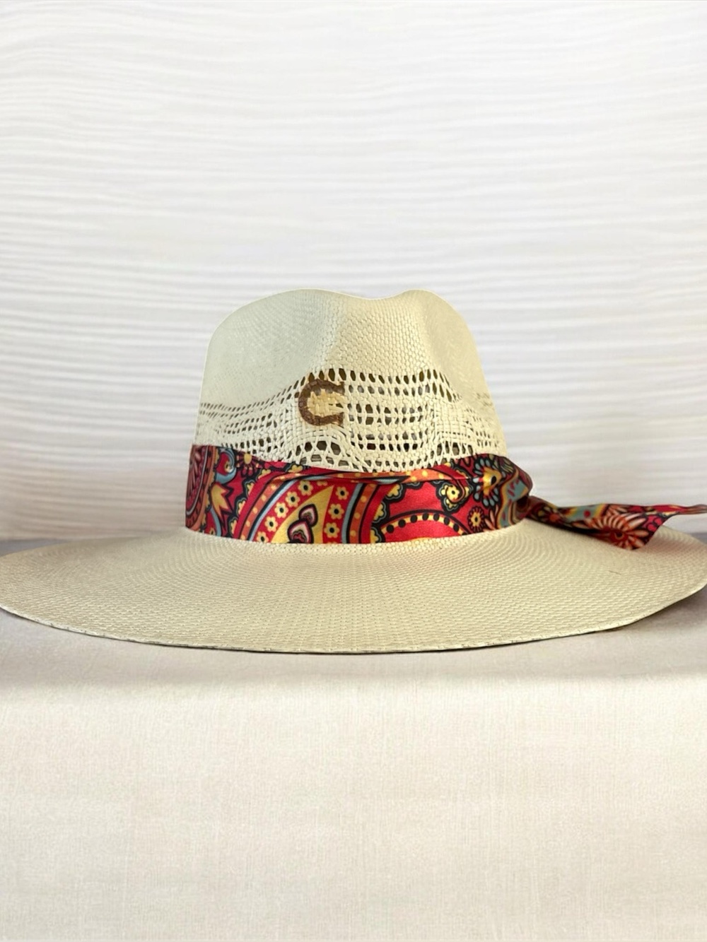 Women’s Cream Straw Panama Hat with Red Paisley Scarf.
Unisex  Charlie, 1 horse